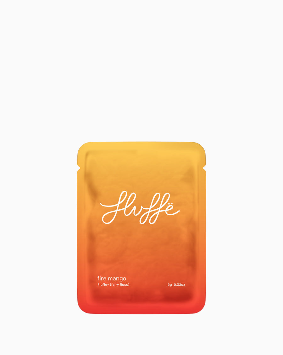 Fluffe fire mango single pack of fairy floss/cotton candy on a white background