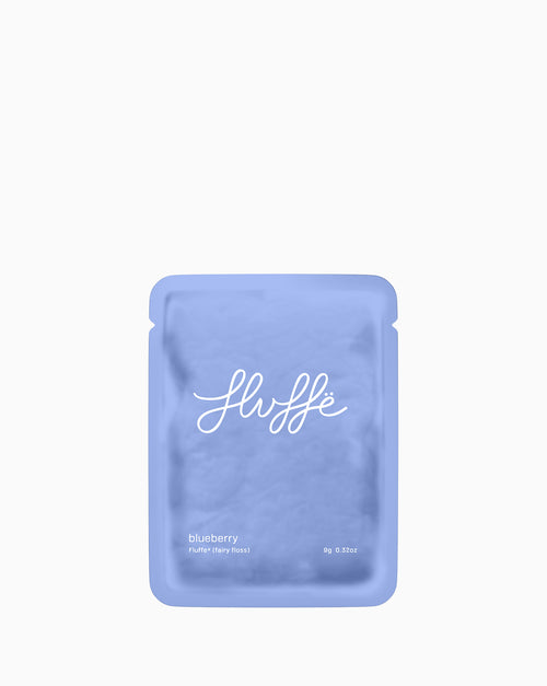 Blueberry bag of Fluffe fairy floss on a white background