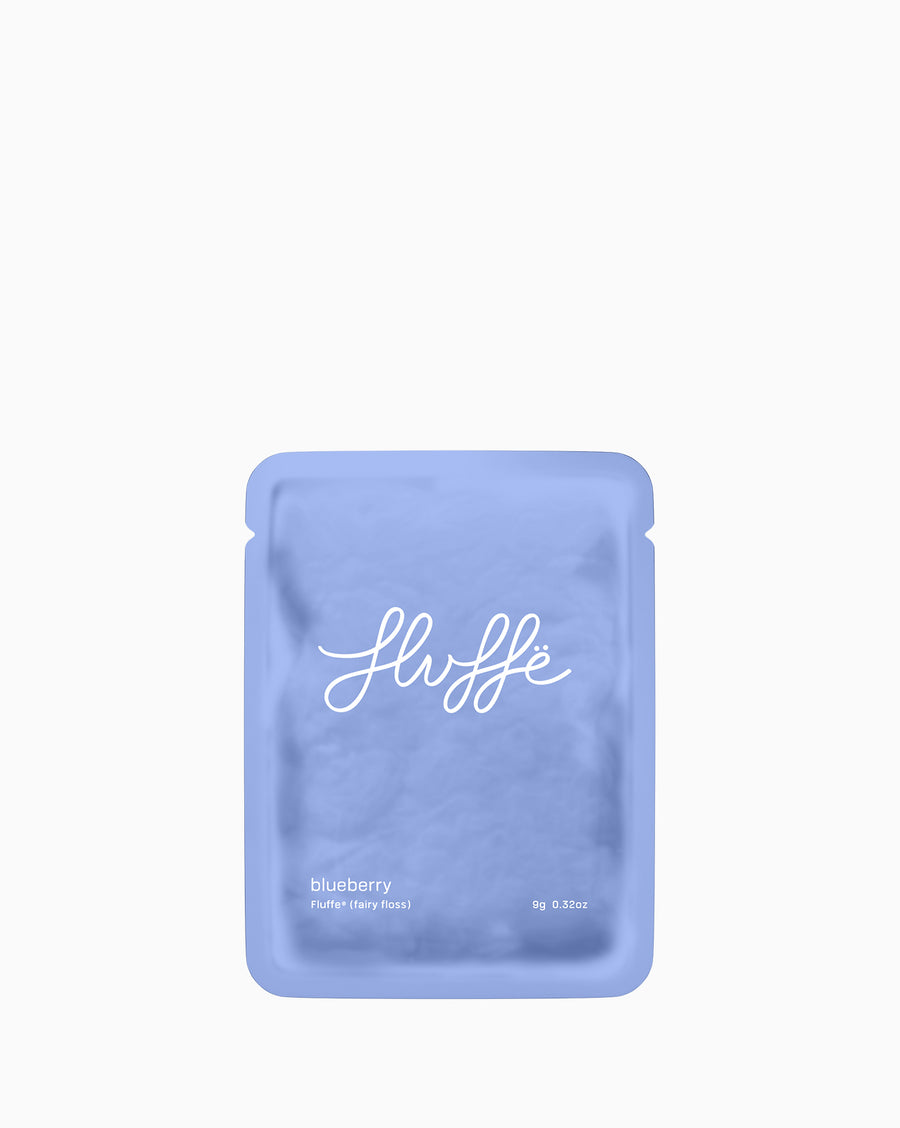 Blueberry bag of Fluffe fairy floss on a white background