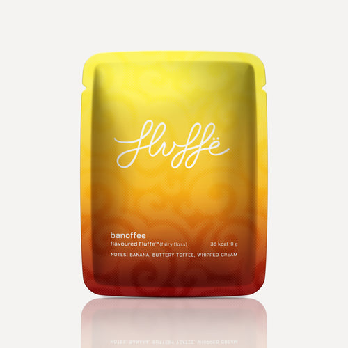 Fluffe Banoffee flavoured fairy floss in a yellow and toffee-coloured 9 g bag.