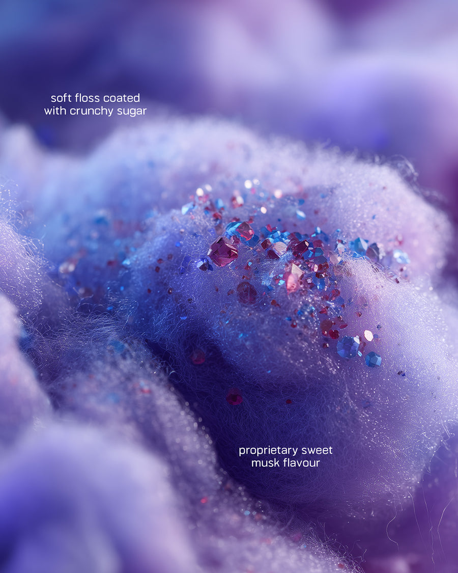 Close-up of soft floss with crunchy sugar and sweet musk flavor text